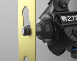 Close-up of the YiZhiLi punching head at a latch opening