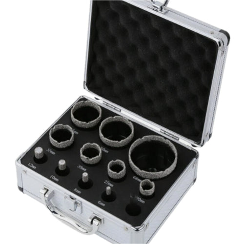 The twelve-piece black cutter and adapter kit in its included open aluminium case.