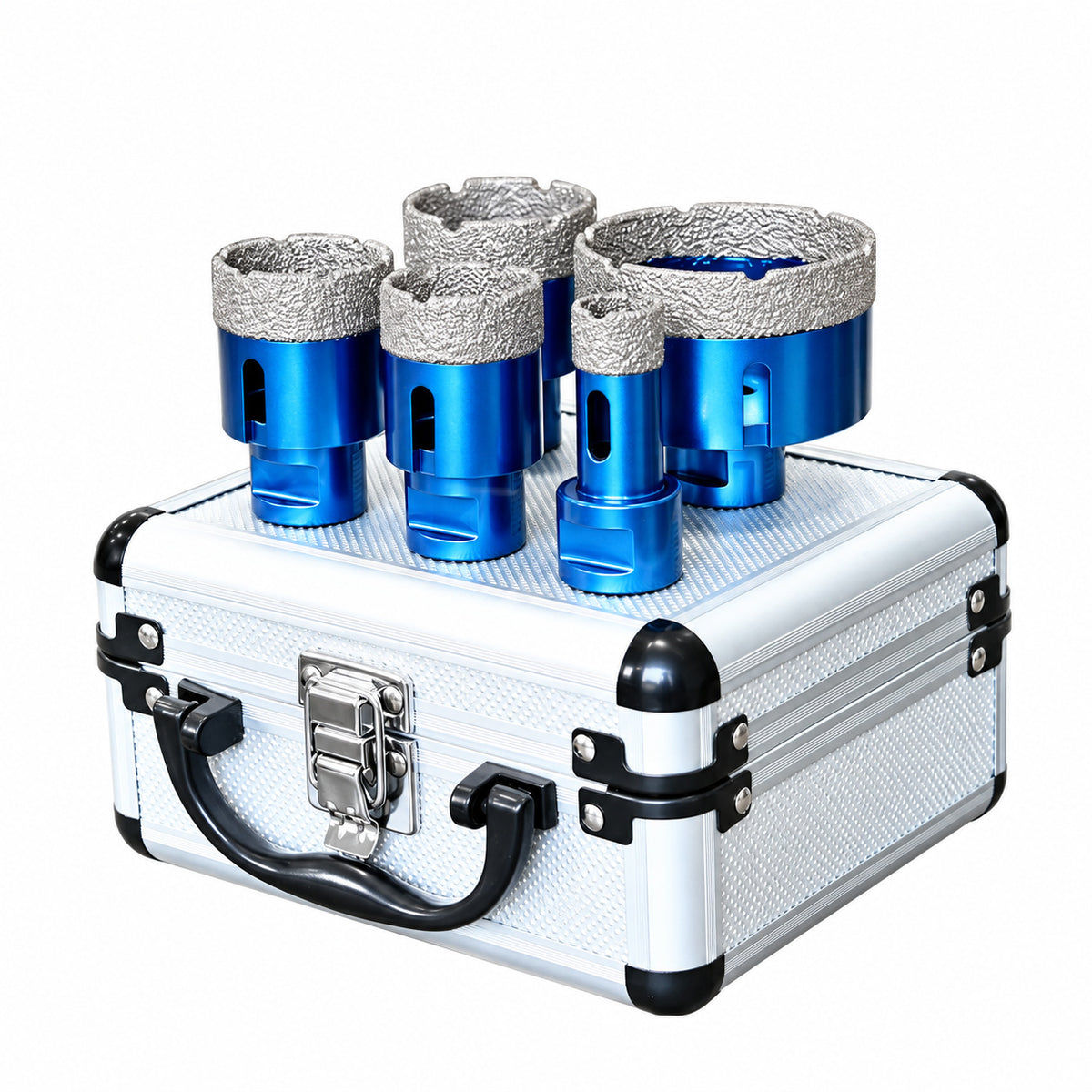 Five blue cup cutters standing on the included closed aluminium storage case.