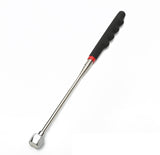 Finger-grip pickup shown with its shaft extended.