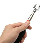 Magnetic head and telescoping sections held in a demonstration hand.