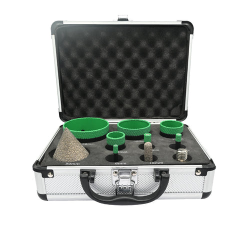 The ten-piece green kit arranged in its included open aluminium case.