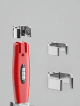 Red basin-wrench handle and three interchangeable fitting inserts.